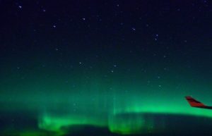 Northern lights, plane, Iceland 